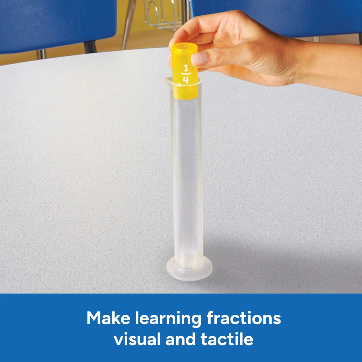 Hand placing a one-fourth fraction piece into a clear cylinder during Fraction Formula game